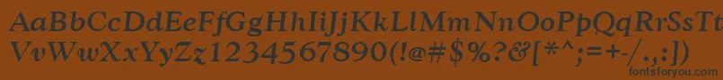 GoudytmedItalic-Schriftart – Schwarze Schriften auf braunem Hintergrund
