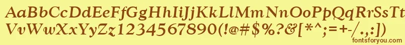 Fonte GoudytmedItalic – fontes marrons em um fundo amarelo