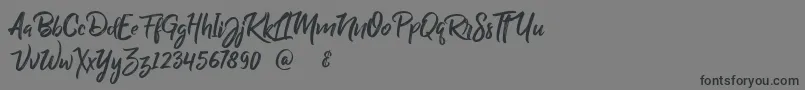 BillyOhio-Schriftart – Schwarze Schriften auf grauem Hintergrund