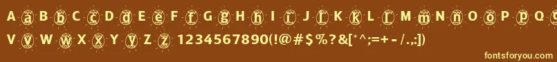 Fonte Adfbeasteregg – fontes amarelas em um fundo marrom