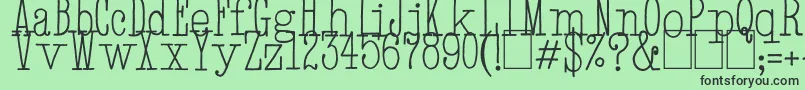 HandTypewriter-fontti – mustat fontit vihreällä taustalla