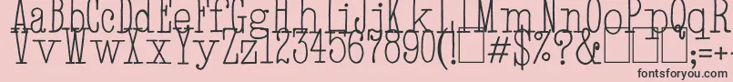 フォントHandTypewriter – ピンクの背景に黒い文字