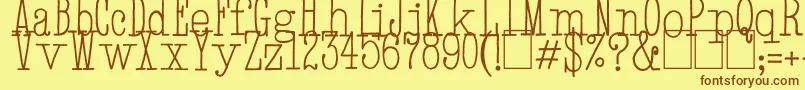 フォントHandTypewriter – 茶色の文字が黄色の背景にあります。