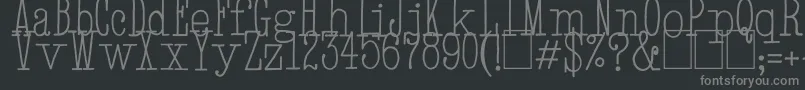 HandTypewriter-fontti – harmaat kirjasimet mustalla taustalla