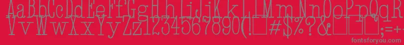 HandTypewriter-fontti – harmaat kirjasimet punaisella taustalla