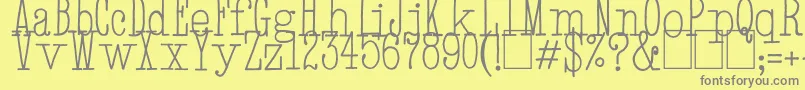 フォントHandTypewriter – 黄色の背景に灰色の文字