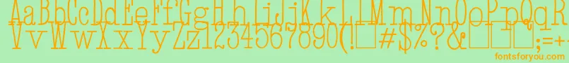 フォントHandTypewriter – オレンジの文字が緑の背景にあります。