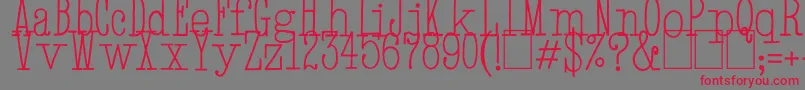 フォントHandTypewriter – 赤い文字の灰色の背景