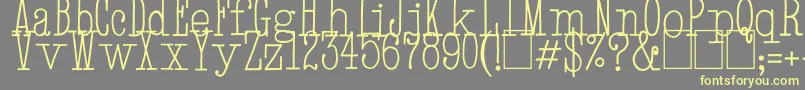 HandTypewriter-fontti – keltaiset fontit harmaalla taustalla