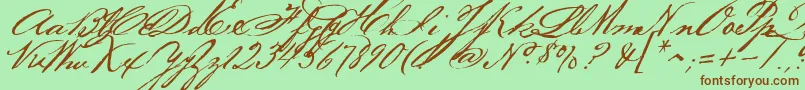 Bakerscript Font – Brown Fonts on Green Background