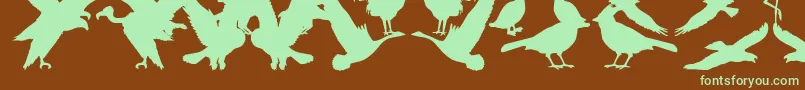 Czcionka BirdsOfAFeather – zielone czcionki na brązowym tle