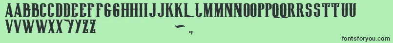 フォントBiglodgetypefree – 緑の背景に黒い文字
