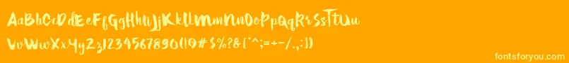 フォントHellotropical – オレンジの背景に黄色の文字