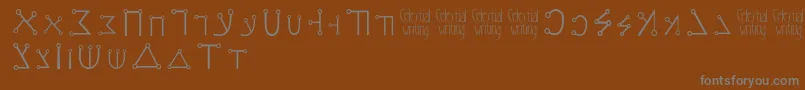 フォントCelestialwriting – 茶色の背景に灰色の文字