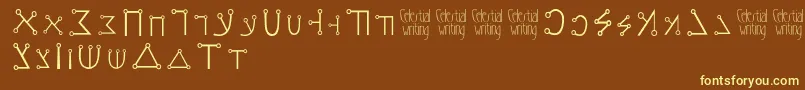 Celestialwriting-fontti – keltaiset fontit ruskealla taustalla