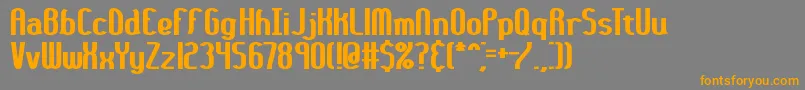 フォント36daythk – オレンジの文字は灰色の背景にあります。