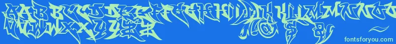 WildbasicFree Font – Green Fonts on Blue Background