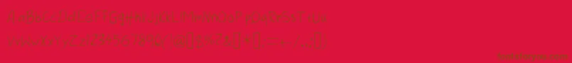 ThreeDots1-Schriftart – Braune Schriften auf rotem Hintergrund