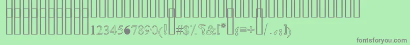 Fonte OldAnticOutline – fontes cinzas em um fundo verde