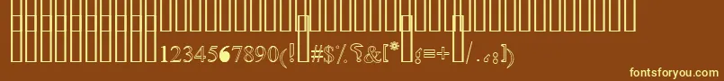 OldAnticOutline-fontti – keltaiset fontit ruskealla taustalla