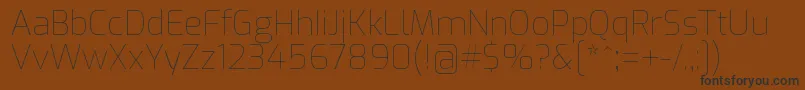 Шрифт ExoThin – чёрные шрифты на коричневом фоне