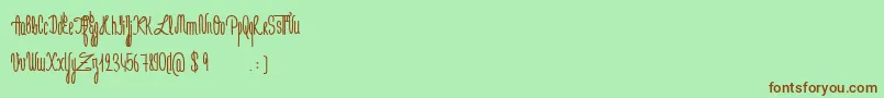 JeNaimePasLeLundiBold-fontti – ruskeat fontit vihreällä taustalla