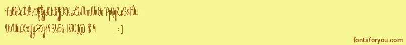 フォントJeNaimePasLeLundiBold – 茶色の文字が黄色の背景にあります。