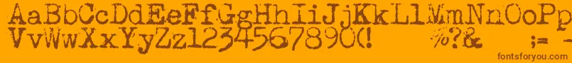 Maszynaaeg Font – Brown Fonts on Orange Background