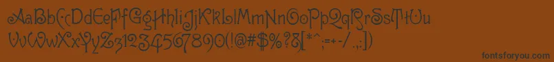 GuttenbergMf-Schriftart – Schwarze Schriften auf braunem Hintergrund
