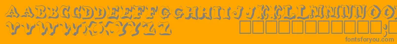 WahoodisplaycapssskRegular-Schriftart – Graue Schriften auf orangefarbenem Hintergrund