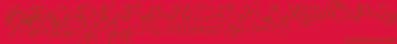 Jandaswirlygirl-fontti – ruskeat fontit punaisella taustalla