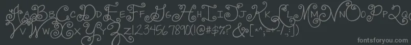 Czcionka Jandaswirlygirl – szare czcionki na czarnym tle