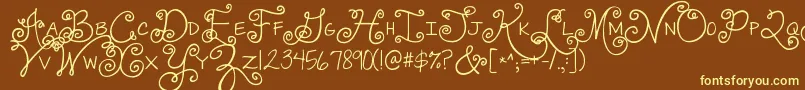 Jandaswirlygirl-fontti – keltaiset fontit ruskealla taustalla