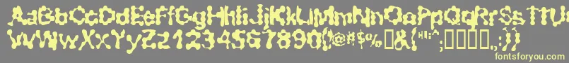 RibbedSmoothOperator-Schriftart – Gelbe Schriften auf grauem Hintergrund