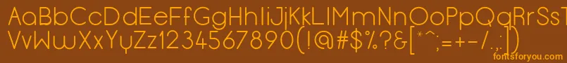 Menulis Font – Orange Fonts on Brown Background