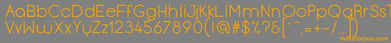 フォントMenulis – オレンジの文字は灰色の背景にあります。