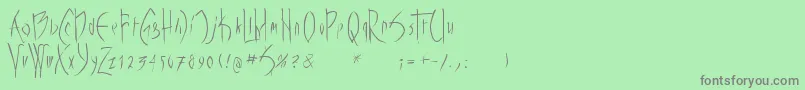 フォントVampyrish – 緑の背景に灰色の文字