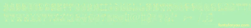 Funnyc-Schriftart – Gelbe Schriften auf grünem Hintergrund