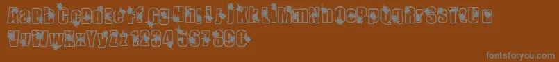 Infestation Font – Gray Fonts on Brown Background