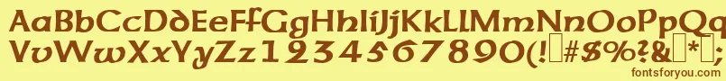 フォントUnzialeRegular – 茶色の文字が黄色の背景にあります。