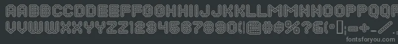 DotsAllForNowInlineJl-fontti – harmaat kirjasimet mustalla taustalla