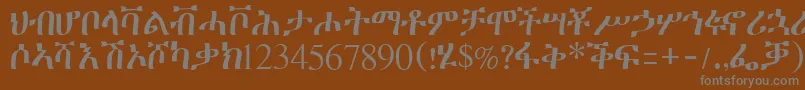 Шрифт Geeztimesssk – серые шрифты на коричневом фоне