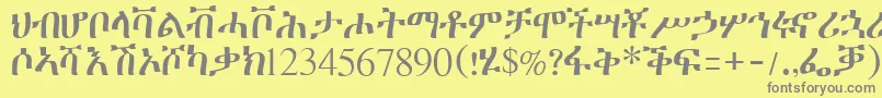 フォントGeeztimesssk – 黄色の背景に灰色の文字