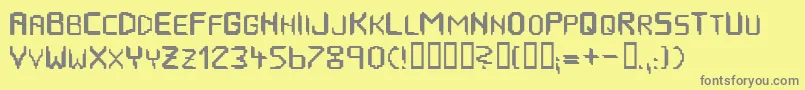 HousepipesNormal-fontti – harmaat kirjasimet keltaisella taustalla
