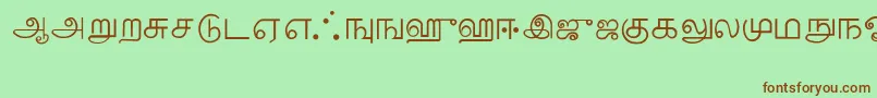 フォントTamil – 緑の背景に茶色のフォント