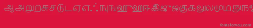 フォントTamil – 赤い背景に灰色の文字