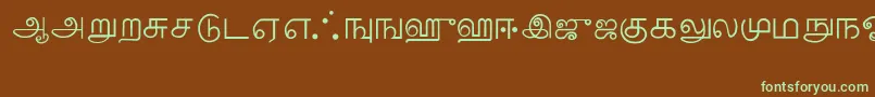 Tamil-Schriftart – Grüne Schriften auf braunem Hintergrund