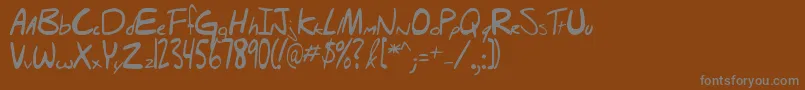 フォントHellobrady – 茶色の背景に灰色の文字