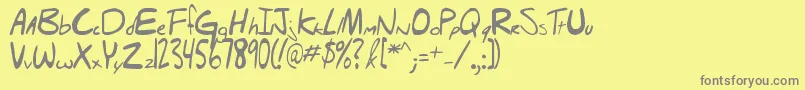 フォントHellobrady – 黄色の背景に灰色の文字