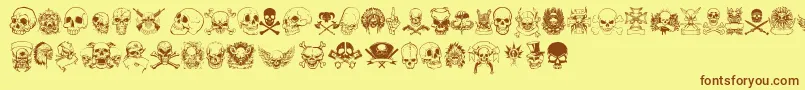 フォントOnlySkulls – 茶色の文字が黄色の背景にあります。